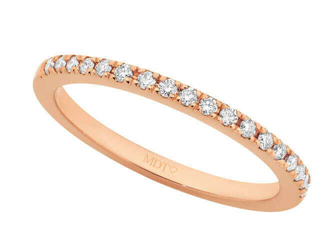 A Rose gold claw set wedding ring C571 with 18 x .01ct round diamonds.
