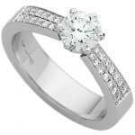 A White Gold Claw Set Round Diamond With Diamonds Band C860 engagement ring with a brilliant cut diamond and round diamond.