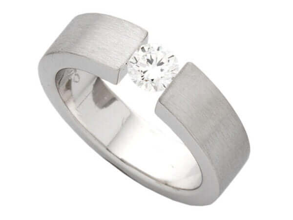A Tension Set Round Brilliant Diamond Ring C364 with a round brilliant diamond set in the center.