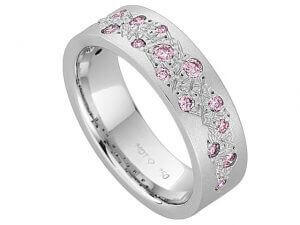 A Random Set Dress Ring With Pink Diamonds C915 set with pink sapphires.