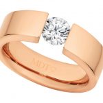 A Rose Gold Tension Set Ring C364 with a round cut diamond, which sits elegantly in the tension set.