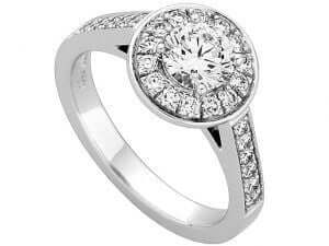 A stunning White Gold Halo Design Grain Set Round Diamond Ring C949 featuring a mesmerizing round diamond set in exquisite white gold.