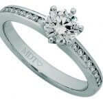 A White Gold Claw Set Round Diamond With channel Diamond Band C954