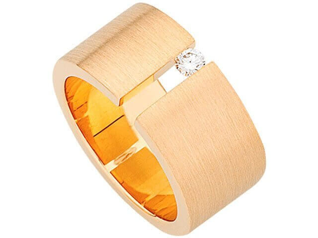 A Wide Tension Set Round Diamond Ring C117 with a tension set round diamond.