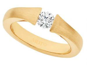 A Yellow gold tension set diamond ring C854.