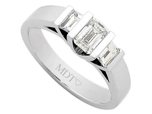 A White Gold Three Stone Emerald Cut Diamond Ring C979 with emerald cut diamonds.