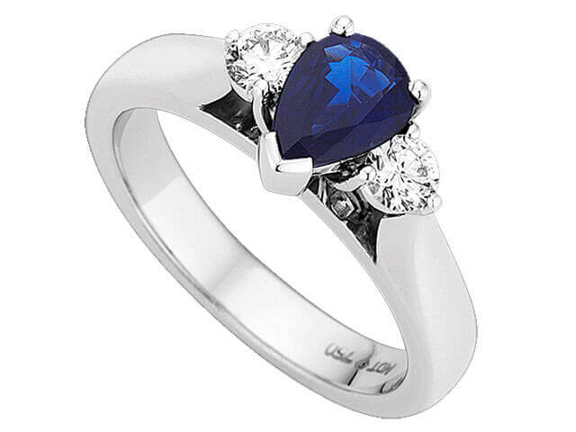 A Pear Shaped Australian Blue Sapphire & Diamond Ring C1213 is the star of this stunning diamond ring.