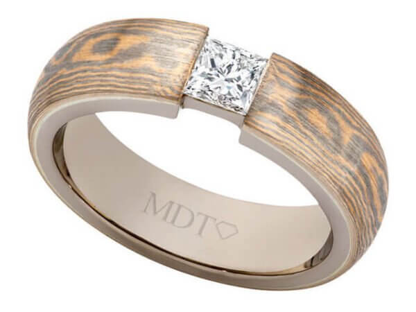 A Mokume Gane with Princess Cut Diamond C1257 men's wedding ring with a princess cut diamond and wood inlay.