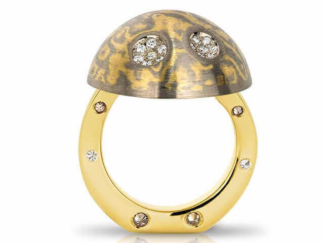 A Nocturnal Light - 2017 Jewellery Award Finalist ring adorned with exquisite diamonds, capturing the attention of jewellery award finalists.