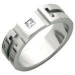 A Patterned Groove and Diamond Ring C480 with diamonds and a square design.