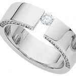 A Tension Set Round Diamond Ring With Diamonds Band C803 with a white gold band.