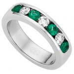 An Emerald & Diamond Band C510 with a white gold band.