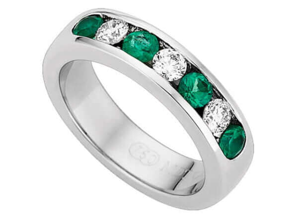 An Emerald & Diamond Band C510 with a white gold band.