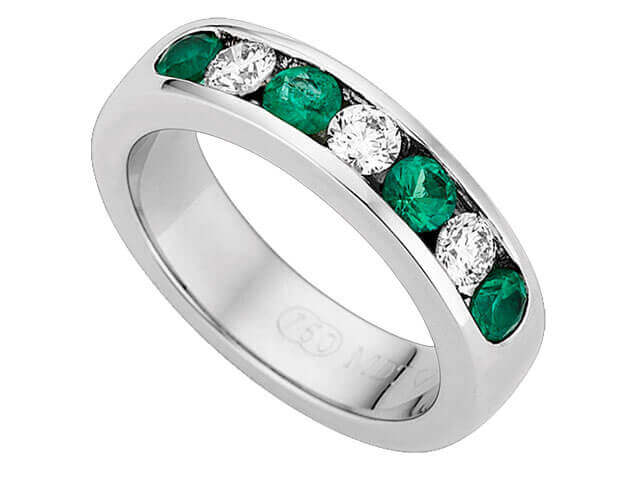 An Emerald & Diamond Band C510 with a white gold band.