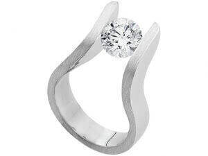 An THE EDGE 18ct White Gold Tension Set C4041 with a diamond in the center.