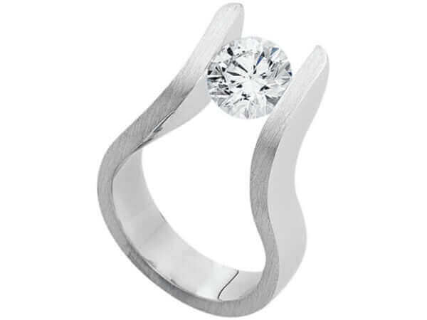 An THE EDGE 18ct White Gold Tension Set C4041 with a diamond in the center.