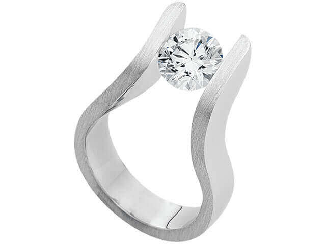 An THE EDGE 18ct White Gold Tension Set C4041 with a diamond in the center.