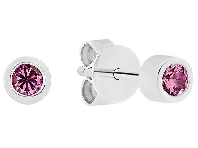 A pair of bezel set sapphire stud earrings (c941-pink saph) on a white background.