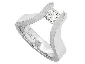 A white gold engagement ring with The Edge Tension Set Princess Cut Diamond Ring.