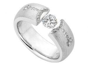 A white gold ring with a diamond in the center and Bubbles -2013 Award Finalist C4053.