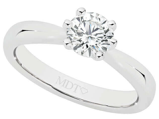 A 6 claw diamond solitaire engagement ring C1000 with a round diamond in the center, held by 6 claw prongs made of white gold.