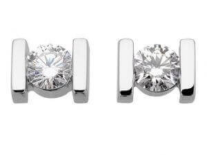 A pair of White Gold Bar Set Diamond Earrings C614 tension set.