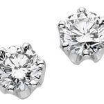 A pair of White Gold Claw Set Diamond Stud Earrings C553 on a white background.