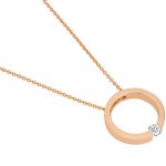 A tension set diamond necklace C1061-RG with a rose gold pendant.