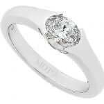 An Half Bezel Set Oval Shaped Diamond Ring C823 with a diamond.