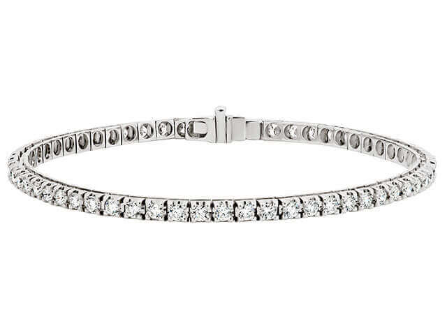 A sparkling claw set diamond tennis bracelet C926 complemented by white gold.