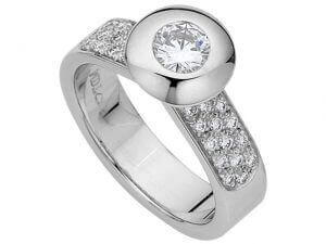 A White Gold Bezel Set Round Diamond Ring With Diamonds Band C637 with a round diamond in the center, creating a stunning White Gold Bezel Set Round Diamond Ring With Diamonds Band C637.