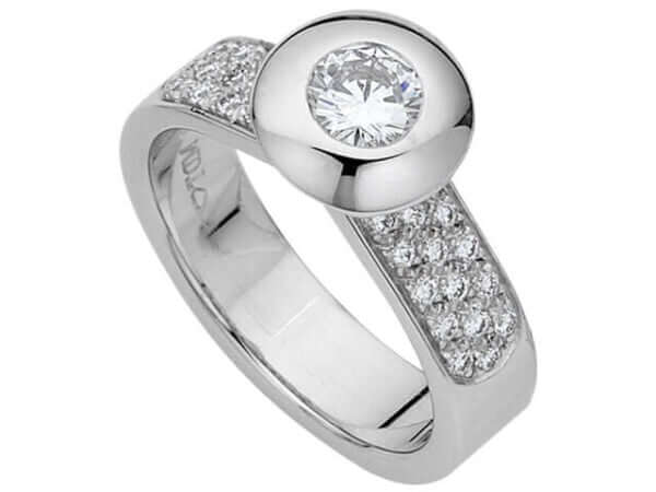 A White Gold Bezel Set Round Diamond Ring With Diamonds Band C637 with a round diamond in the center, creating a stunning White Gold Bezel Set Round Diamond Ring With Diamonds Band C637.