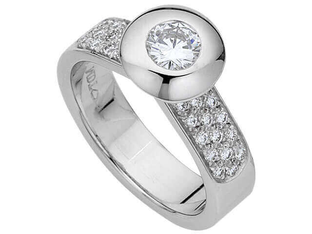 A White Gold Bezel Set Round Diamond Ring With Diamonds Band C637 with a round diamond in the center, creating a stunning White Gold Bezel Set Round Diamond Ring With Diamonds Band C637.