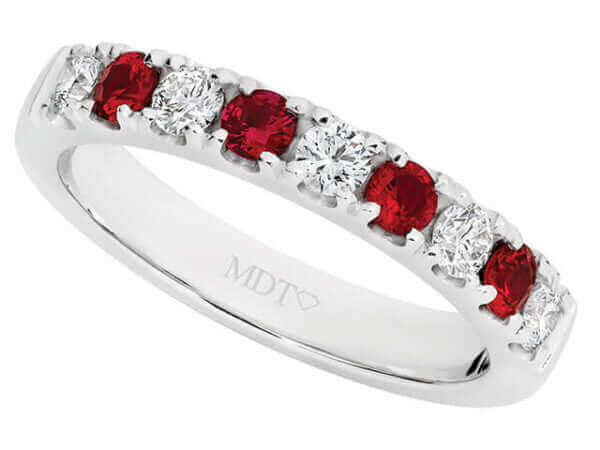 A claw set ruby wedding ring C577 in white gold.