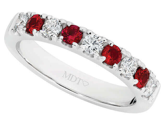 A claw set ruby wedding ring C577 in white gold.