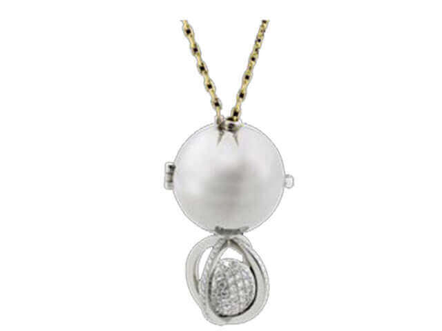 A pendant with a Soiree -2006 Award Winner and diamonds on a chain, perfect for a Soiree or as an elegant 2006 Award Winner accessory.