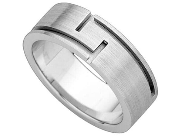 A men's wedding ring with a Flat Band with Cut Out Grooves C680 and engraved design.