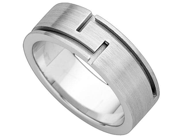A men's wedding ring with a Flat Band with Cut Out Grooves C680 and engraved design.