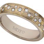 A Mokume Gane with Random Set Diamonds C726 ring.