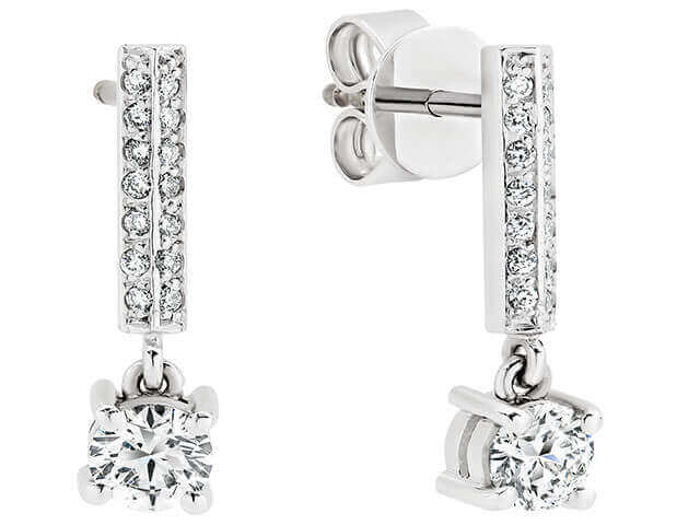 A stunning pair of 4 claw diamond drop earrings C635 in elegant white gold.