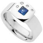 A white gold ring with a Princess Cut Sapphire & Diamond Ring C739.
