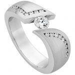 A White Gold Tension Set Round Diamond Ring With Channel Set Diamonds Band C741 with a round diamond set in the center.