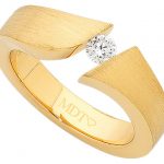 Yellow Gold Flat Tension Set Round Diamond Ring C745, with a round diamond in the center.