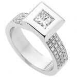 A stunning White Gold Bezel Set Princess Cut Diamond Ring With Diamonds Band C743 featuring a princess cut diamond set in elegant white gold.