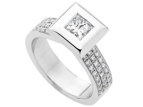 A stunning White Gold Bezel Set Princess Cut Diamond Ring With Diamonds Band C743 featuring a princess cut diamond set in elegant white gold.