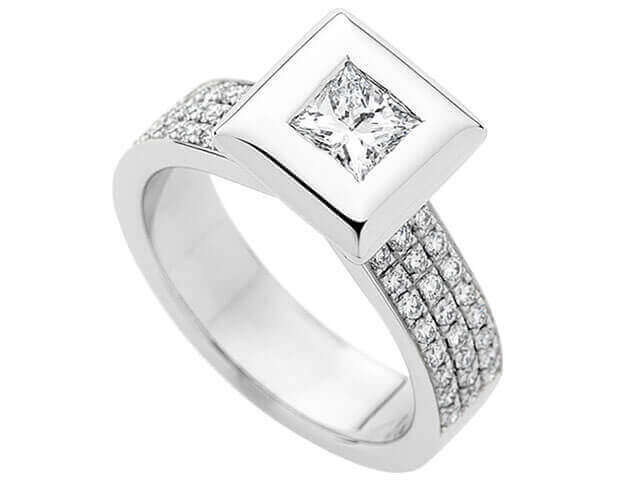 A stunning White Gold Bezel Set Princess Cut Diamond Ring With Diamonds Band C743 featuring a princess cut diamond set in elegant white gold.