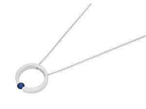 A Tension Set Blue Sapphire Necklace C1061, featuring a silver circle pendant adorned with a captivating blue sapphire stone (C1061).