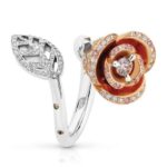 A Rosa - 2018 Jewellery Design Finalist ring adorned with diamonds and delicate rose leaves.