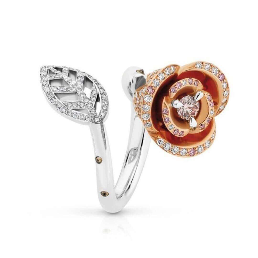 A Rosa - 2018 Jewellery Design Finalist ring adorned with diamonds and delicate rose leaves.