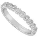 A stunning Bezel Set Round Diamond 18ct white gold Wedding Band C468 featuring bezel-set round diamonds.